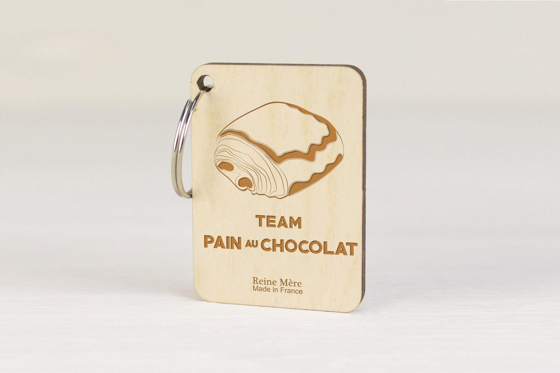 Porte-clés Pain au Chocolat vs Chocolatine - Reine Mère